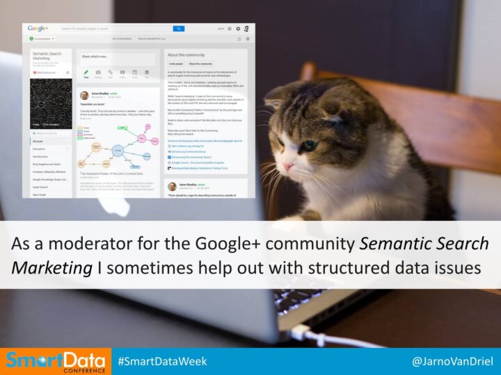 An image of a cat sitting on a chair working on a laptop on a desk, overlayed with a screenshot of the G+ Semantic Search Marketing group. Symbolizing Jarno van Driel's participation in that community, both as a member and as a moderator.